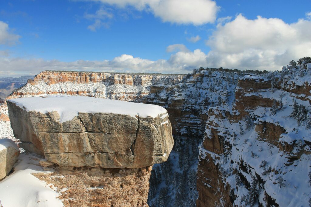 Stunning winter view of snow-dusted cliffs at the Grand Canyon.